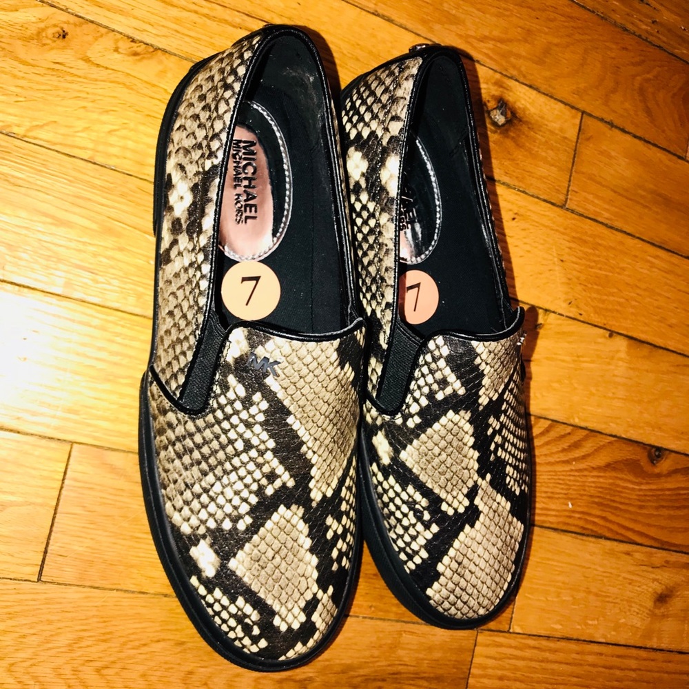 Brand new. Snake skin Michael Kors women’s shoes.